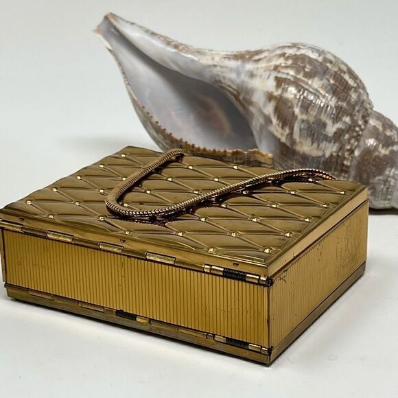 Vintage, gold tone compact/purse.  